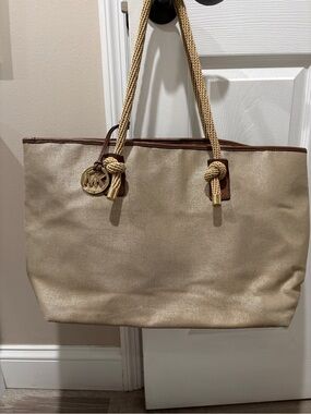 Michael Kors Beige Canvas Tote with Rope Handles and Gold MK Charm